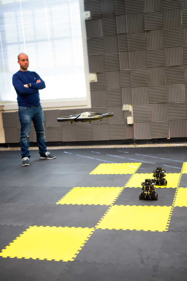 Venanzio Cichella watches autonomous vehicles operate in the lab